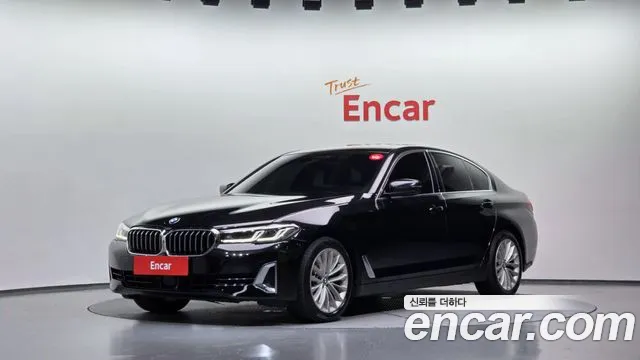 BMW 5-Series 2023 — photo 1