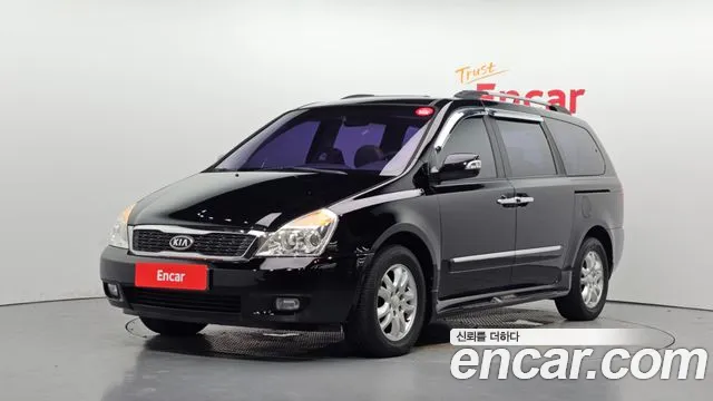Kia Canival 2012 — photo 1