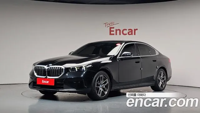 BMW 5-Series 2024 — photo 1