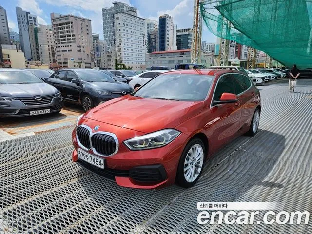 BMW 1-Series 2021 — photo 1