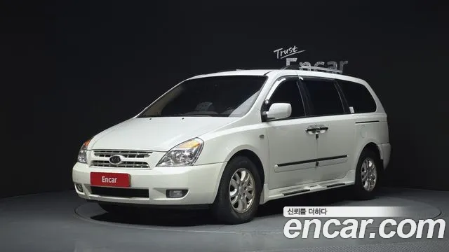 Kia Canival 2009 — photo 1