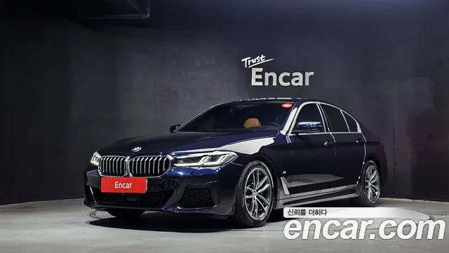 BMW 5-Series 2023 — photo 1