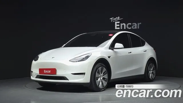 Tesla Model Y 2021 — photo 1
