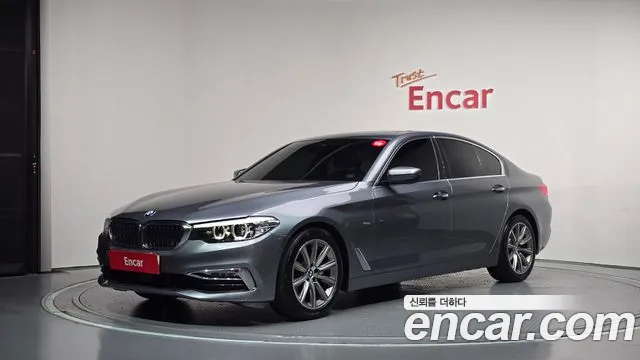 BMW 5-Series 2018 — photo 1