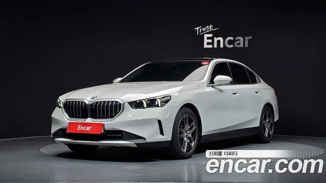 BMW 5-Series 2024 — photo 1