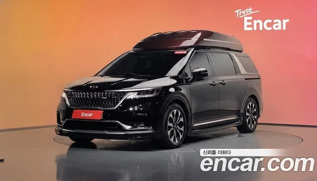 Kia Canival 2021 — photo 1