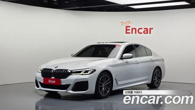 BMW 5-Series 2021 — photo 1