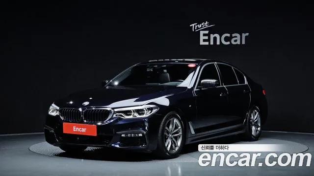BMW 5-Series 2018 — photo 1