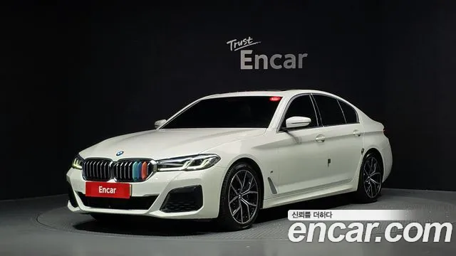 BMW 5-Series 2023 — photo 1