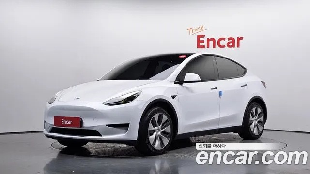 Tesla Model Y 2024 — photo 1