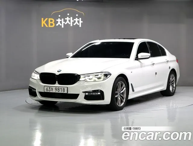 BMW 5-Series 2018 — photo 1