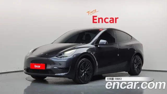 Tesla Model Y 2025 — photo 1