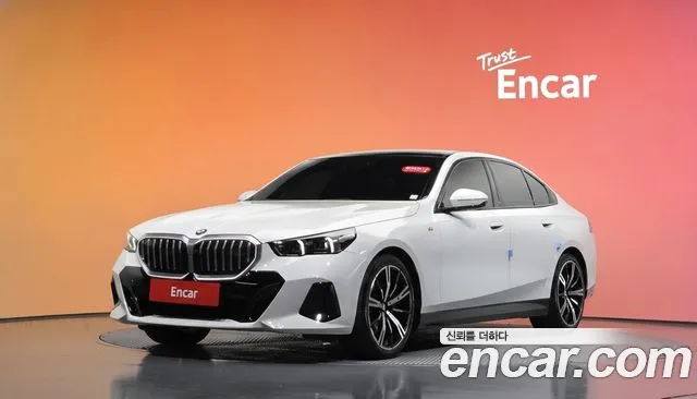 BMW 5-Series 2024 — photo 1