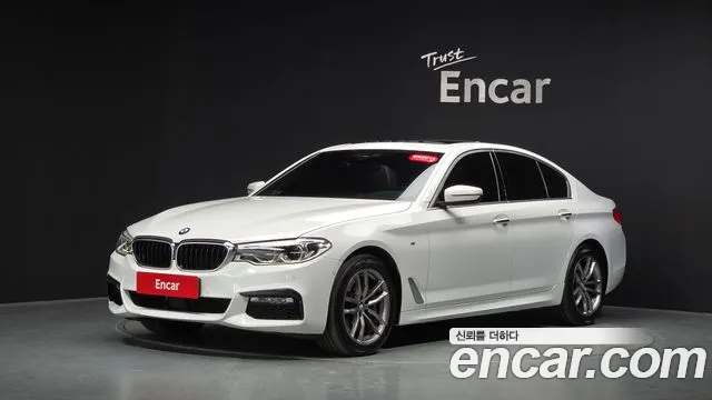 BMW 5-Series 2018 — photo 1