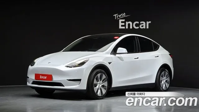 Tesla Model Y 2024 — photo 1