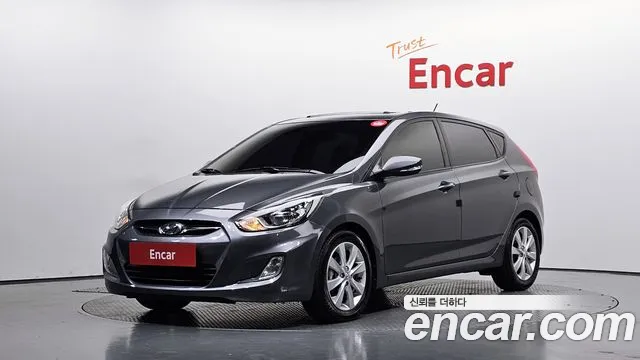 Hyundai Accent 2012 — photo 1