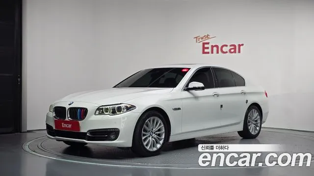 BMW 5-Series 2014 — photo 1