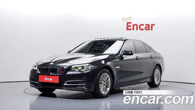 BMW 5-Series 2015 — photo 1