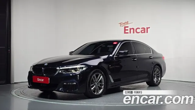 BMW 5-Series 2018 — photo 1