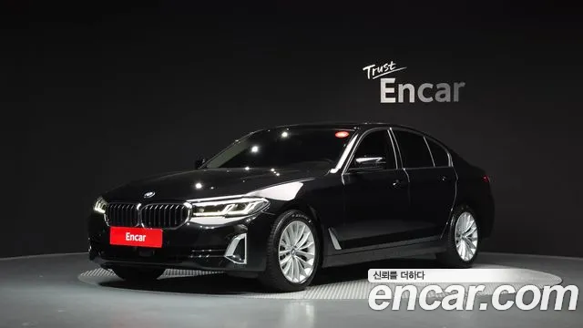 BMW 5-Series 2023 — photo 1