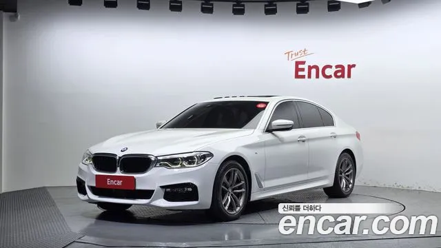 BMW 5-Series 2018 — photo 1