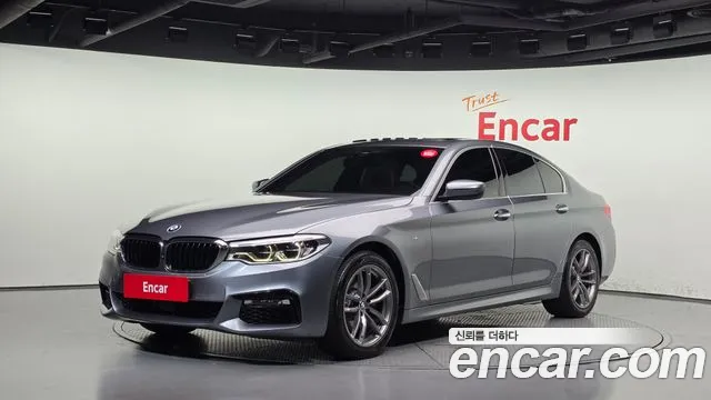 BMW 5-Series 2018 — photo 1