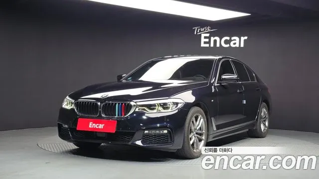 BMW 5-Series 2018 — photo 1