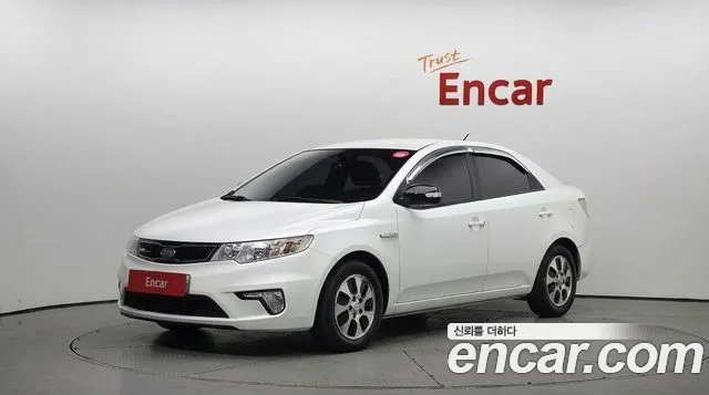 Kia Porte 2013 — photo 1