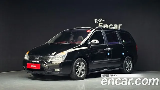 Kia Canival 2013 — photo 1