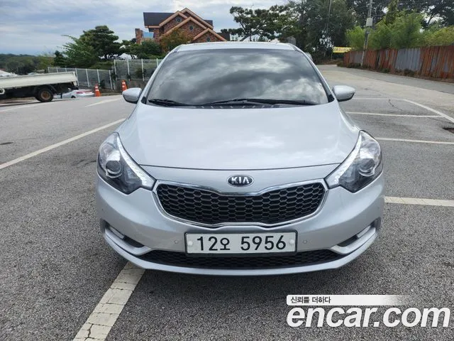 Kia K3 2015 — photo 1