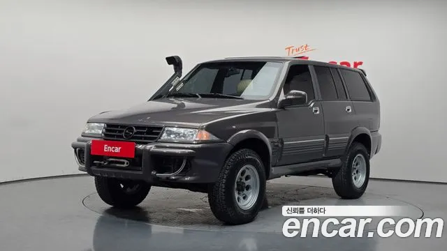 KG Mobility Musso 1997 — photo 1