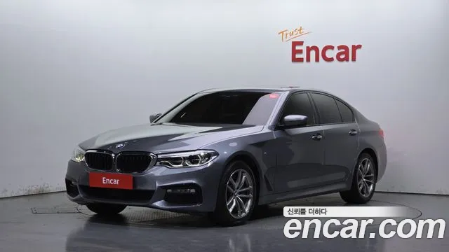 BMW 5-Series 2017 — photo 1