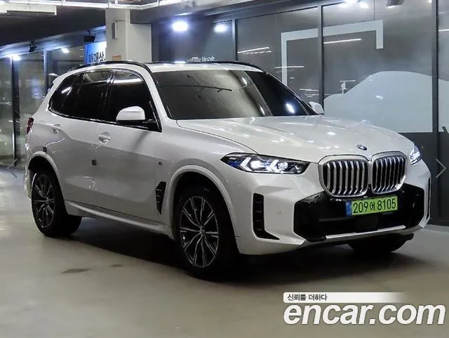 BMW X5 2024 — photo 1
