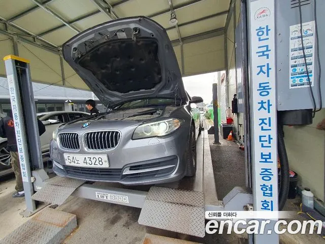 BMW 5-Series 2014 — photo 1
