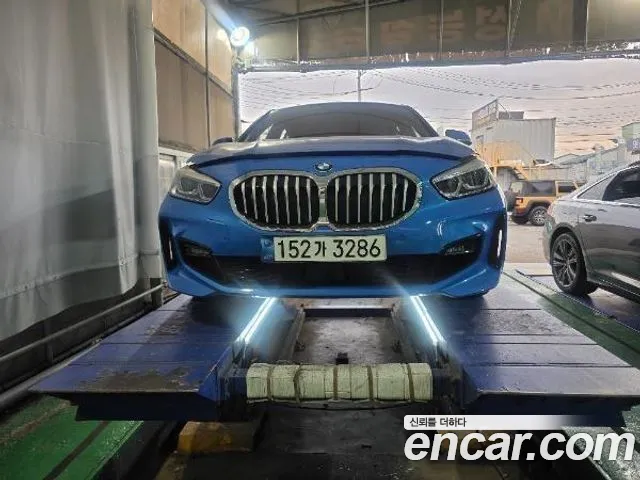 BMW 1-Series 2021 — photo 1