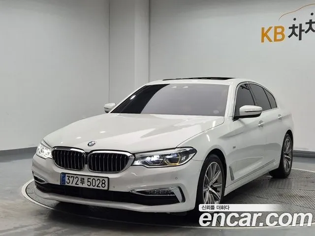 BMW 5-Series 2018 — photo 1