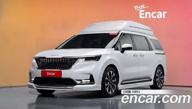 Kia Canival 2023 — photo 1