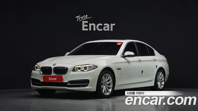 BMW 5-Series 2015 — photo 1