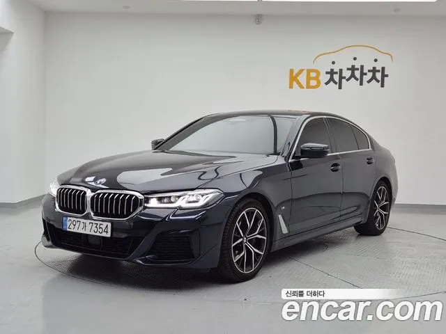 BMW 5-Series 2022 — photo 1