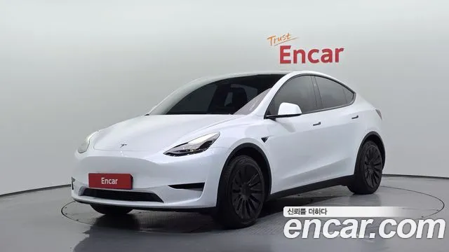 Tesla Model Y 2024 — photo 1