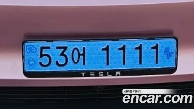 Tesla Model Y 2025 — photo 1
