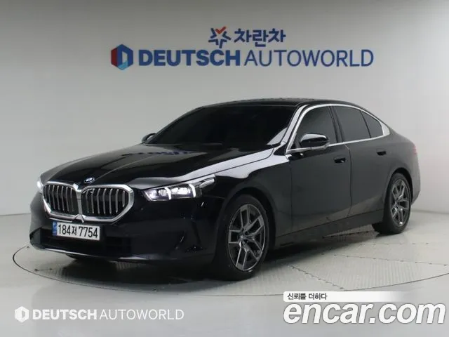 BMW 5-Series 2024 — photo 1