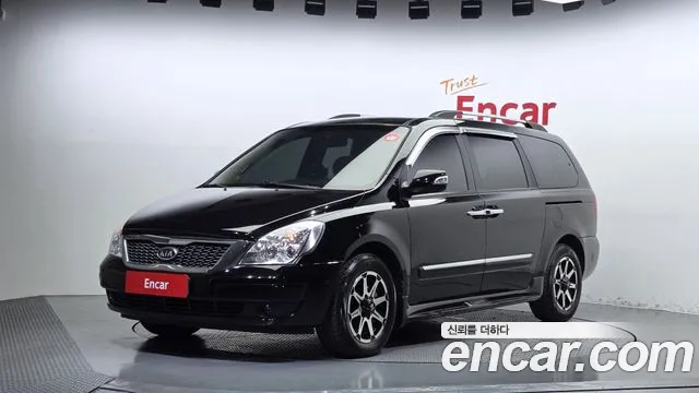 Kia Canival 2012 — photo 1