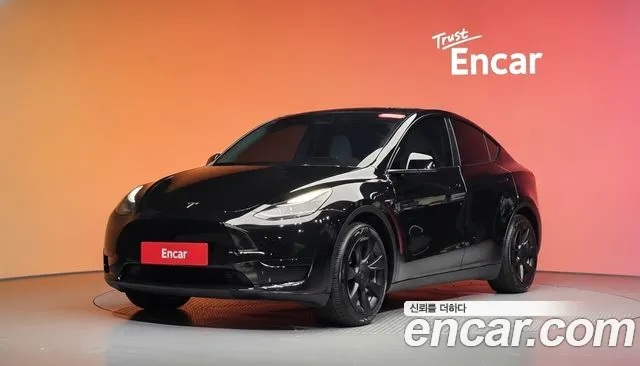 Tesla Model Y 2024 — photo 1