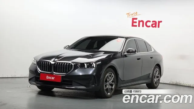 BMW 5-Series 2024 — photo 1