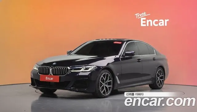 BMW 5-Series 2023 — photo 1