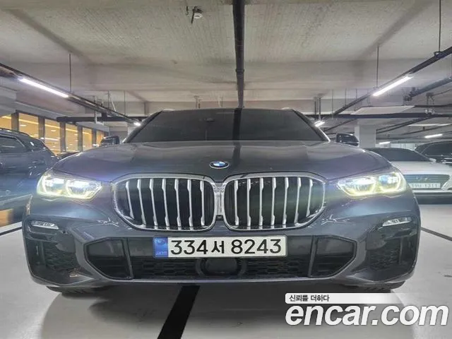 BMW X5 2021 — photo 1