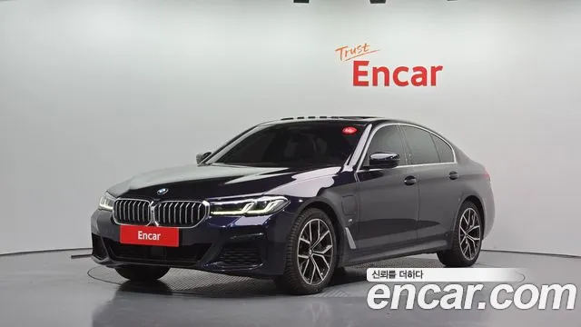 BMW 5-Series 2021 — photo 1