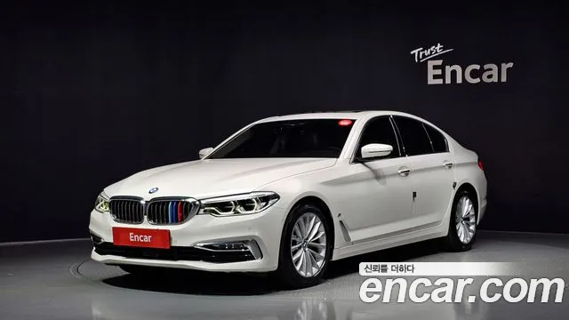 BMW 5-Series 2018 — photo 1