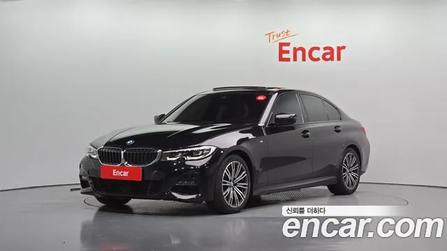 BMW 3-Series 2022 — photo 1